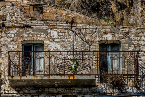 Abandoned ruins of the ghost town of Craco. A city abandoned due to an earthquake in the late 20th century. Province of Matera, Basilicata, Italy photo