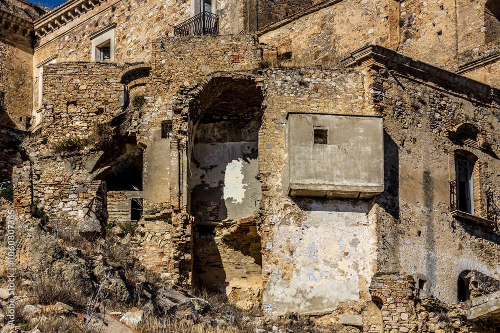Abandoned ruins of the ghost town of Craco. A city abandoned due to an earthquake in the late 20th century. Province of Matera, Basilicata, Italy