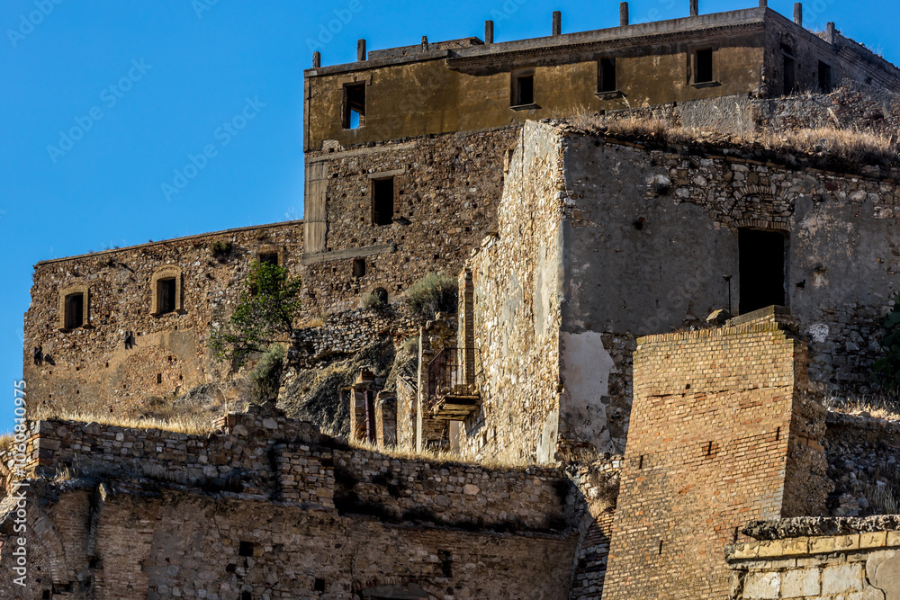 Abandoned ruins of the ghost town of Craco. A city abandoned due to an earthquake in the late 20th century. Province of Matera, Basilicata, Italy