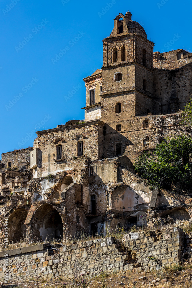 Abandoned ruins of the ghost town of Craco. A city abandoned due to an earthquake in the late 20th century. Province of Matera, Basilicata, Italy