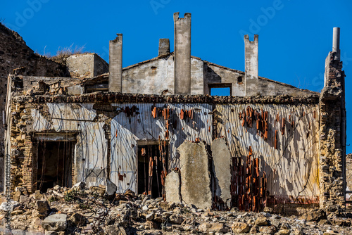 Abandoned ruins of the ghost town of Craco. A city abandoned due to an earthquake in the late 20th century. Province of Matera, Basilicata, Italy photo