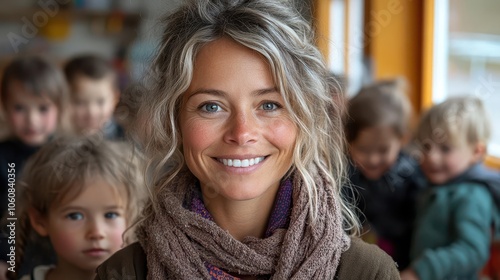 engaging and warm portrait of a dedicated nursery school teacher smiling at the camera while surrounded by playful children embodying joy and learning in an educational setting