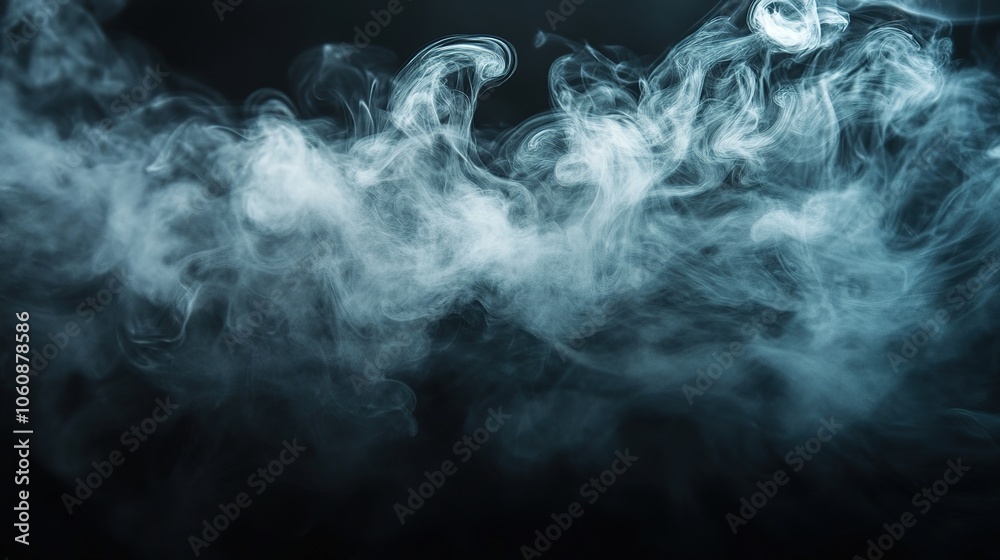 Obraz premium A dramatic scene featuring swirling smoke against a deep black background, creating a mysterious and captivating atmosphere, ideal for use in artistic and creative projects