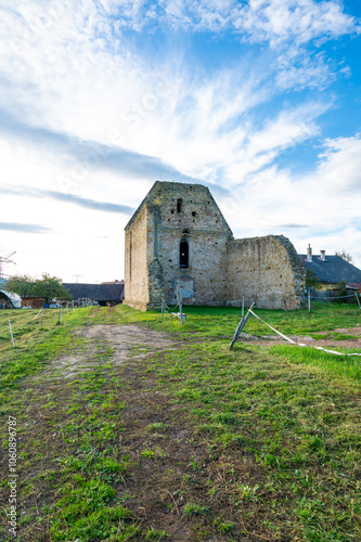Obraz na płótnie A photo of the ruins of the Koruna Svate Marie Monastery near the village of Trebarov. The ancient stone walls and arches stand as a testament w salonie