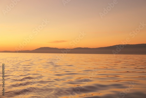 Sunset with Silhoutted Mountain Range in the Atlantic Ocean