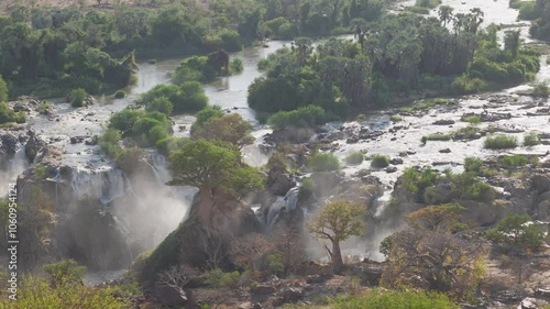 Epupa Falls (also known as Monte Negro Falls in Angola) is a series of large waterfalls formed by the Kunene River on the border of Angola and Namibia. 4K video V Log to Rec.709
