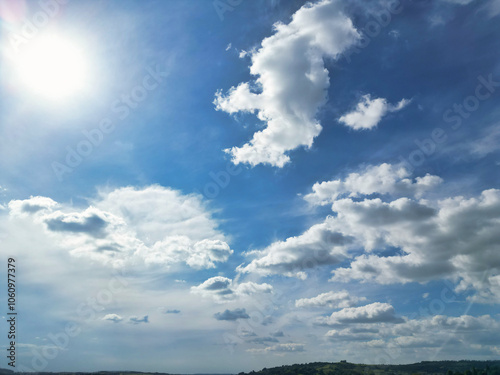 High Angle View of Most Beautiful Clean Sky and Dramatical Clouds over City of England UK. Drone's Camera Footage from High Altitude.