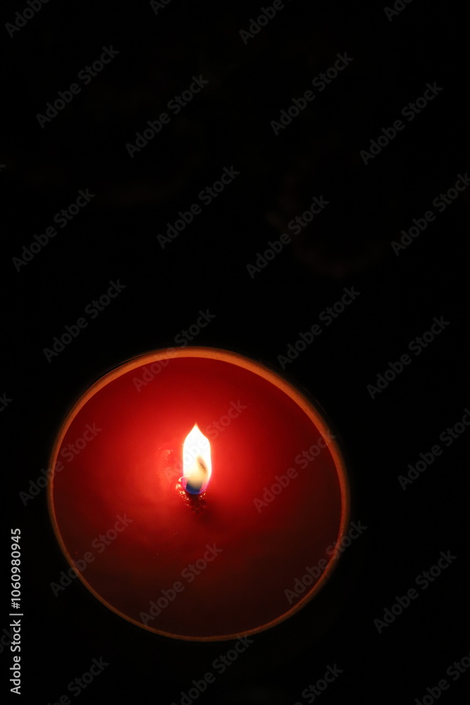 a lit cemetery lamp with a natural flame on All Souls' Day in Poland a lit cemetery lamp with a natural flame on All Souls' Day in Poland