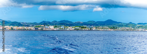 A panorama view down the coast to the east oft Ponta Delgada on the island of San Miguel in the Azores in summertime photo