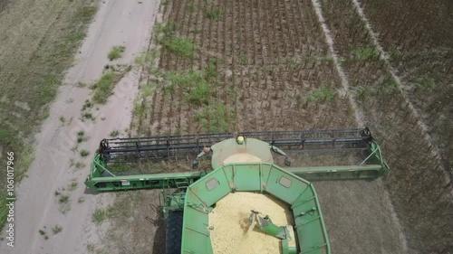 Multiple Machines Harvesting Soybeans in the Fields