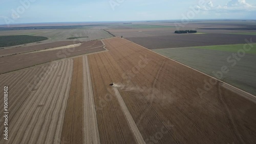 Red Harvester in Action: Soybean Harvesting
