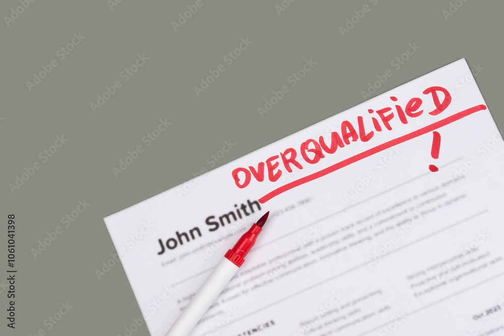 Fake mock CV (curriculum vitae) for John Smith, rejected by HR as not the right Overqualified candidate. Concept of job search, hiring mismatch, recruitment process, and rejection. Fake mock CV (curriculum vitae) for John Smith, rejected by HR as not the right Overqualified candidate. Concept of job search, hiring mismatch, recruitment process, and rejection.