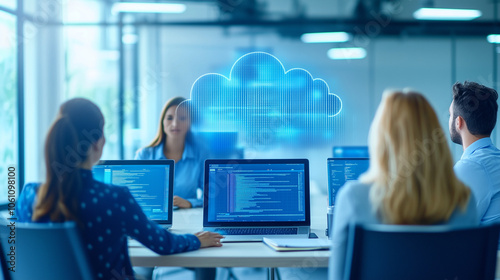 Woman Leading Cloud Computing Session With Coworkers