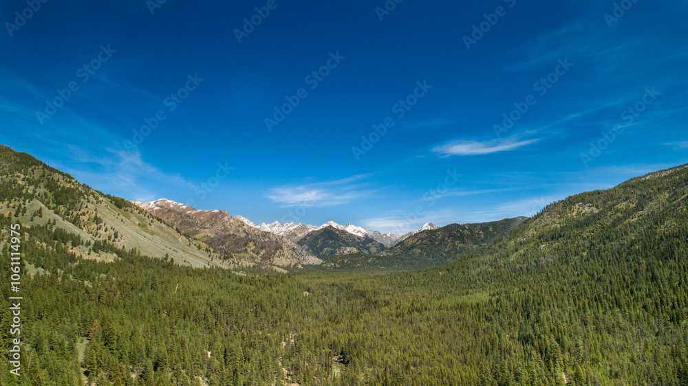 Majestic Mountain Range Under a Clear Blue Sky Majestic Mountain Range Under a Clear Blue Sky