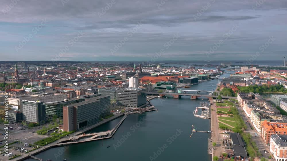 Skyline cityscape panorama of Indre By (Inner City) in Copenhagen, Denmark. Wide panoramic aerial view on a sunny summer day. Skyline cityscape panorama of Indre By (Inner City) in Copenhagen, Denmark. Wide panoramic aerial view on a sunny summer day.