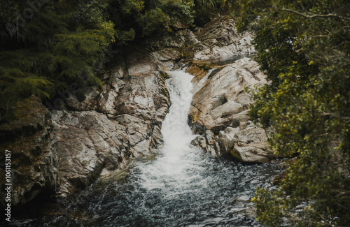 Waterfall captured from above on bridge