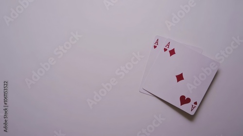 Two Aces, One Heart, One Diamond, on a White Background photo