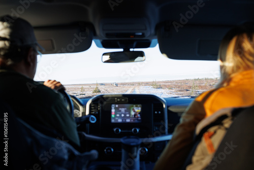 Driving a car in the wild in Churchill, Manitoba, Canada. photo