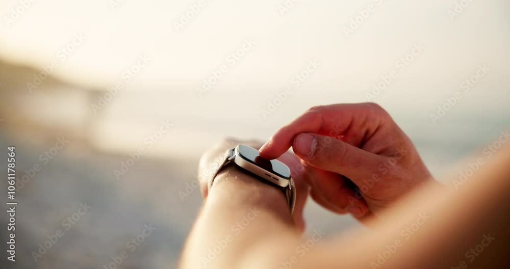 Person, hands and browsing with smart watch on beach for fitness tracker or step counter in nature. Closeup, runner or user with wristwatch app for checking calories, distance or performance by ocean Person, hands and browsing with smart watch on beach for fitness tracker or step counter in nature. Closeup, runner or user with wristwatch app for checking calories, distance or performance by ocean