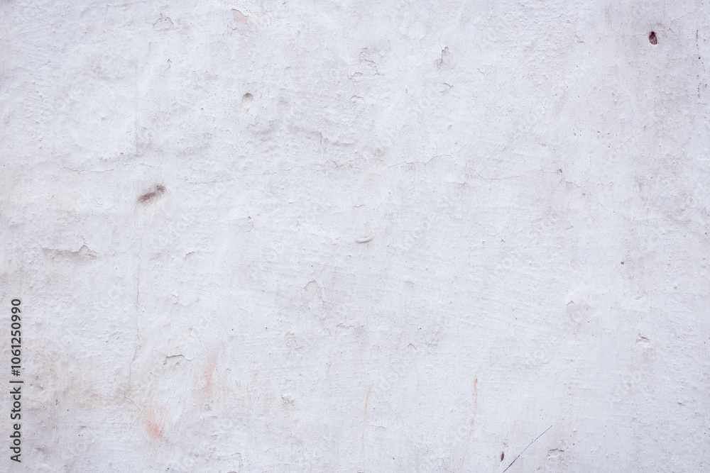 Fototapeta premium Grey peeling wall with natural defects. Fragment of the concrete shabby surface with natural texture. Red white palette of shades.