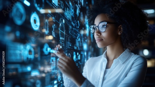 Female entrepreneur thoughtfully checking digital inventory in a warehouse, ideal for supply chain and logistics management themes photo