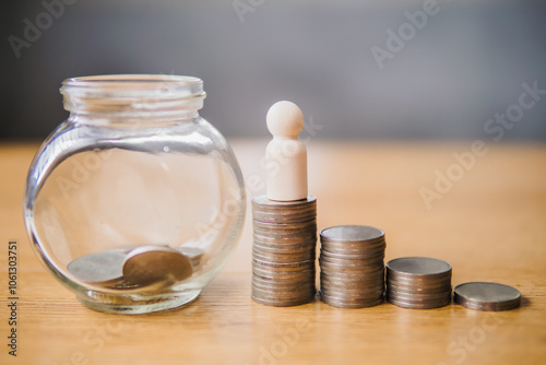 Save money with stack money coins for growing your business. Money financial planning concept. Saving money and investing is growing wealthy and sustainable for the future concept.