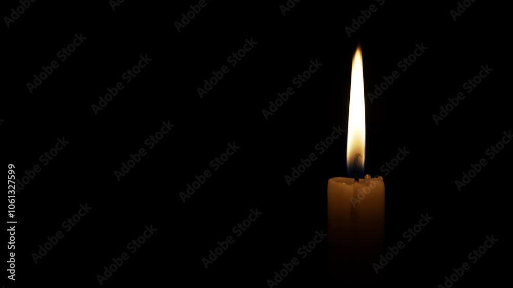 A single candle burns brightly in complete darkness, symbolizing hope and remembrance during a somber religious ceremony focused on grief and loss, bringing comfort to those in mourning. A single candle burns brightly in complete darkness, symbolizing hope and remembrance during a somber religious ceremony focused on grief and loss, bringing comfort to those in mourning.