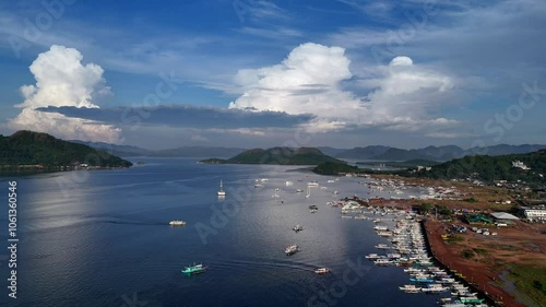 Majestic Sunrise Over Coron Island, Philippines – 4K Drone View of Tropical Paradise with Lush Mountains and Crystal Waters