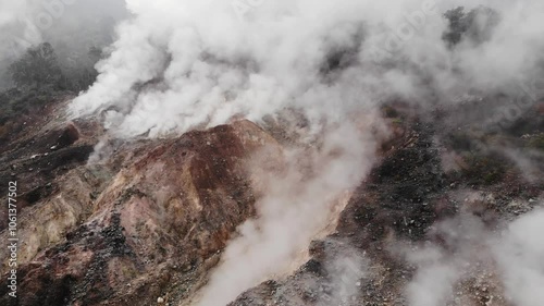 Aerial view of dramatic geological formations in a volcano crater