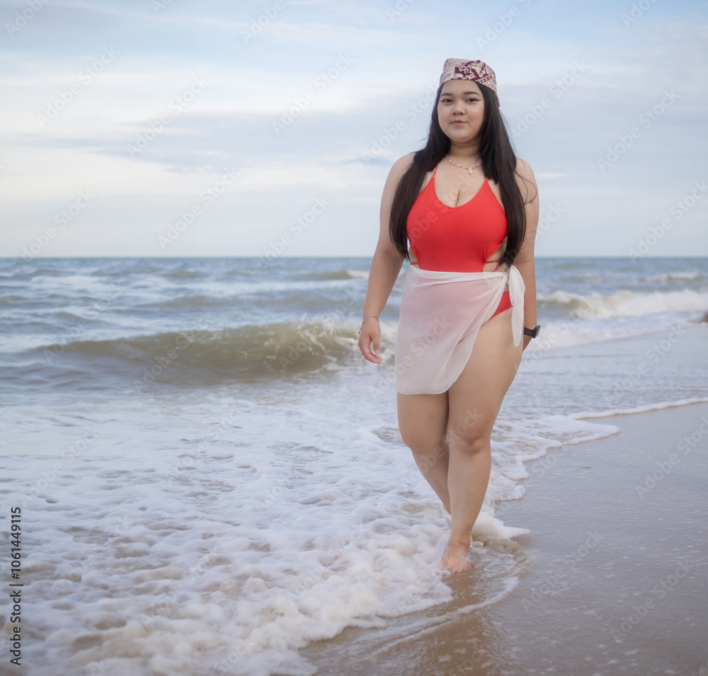 Woman young asian fat chubby cute beautiful smile happy fun enjoy relax freedom bikini swimwear body sexy plus size look sea beach sunset clean blue sky calm nature ocean wave water travel on holiday Woman young asian fat chubby cute beautiful smile happy fun enjoy relax freedom bikini swimwear body sexy plus size look sea beach sunset clean blue sky calm nature ocean wave water travel on holiday