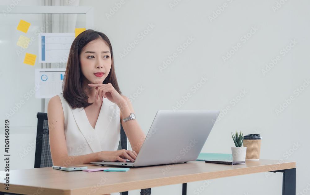 Manager employee woman girl asian one person smile happy enjoy sitting chair on desk looking hand holding notebook laptop ready for business working job online sale inside the room office company Manager employee woman girl asian one person smile happy enjoy sitting chair on desk looking hand holding notebook laptop ready for business working job online sale inside the room office company