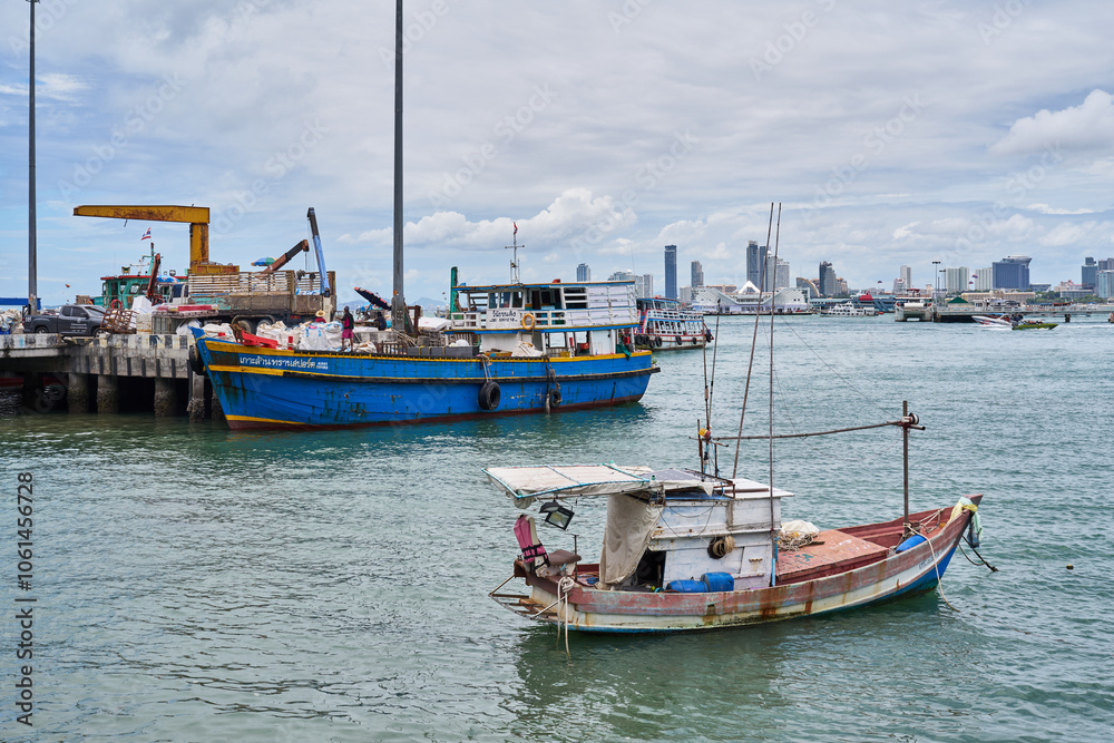 Fishing and cargo boats in Pattaya, Thailand Fishing and cargo boats in Pattaya, Thailand