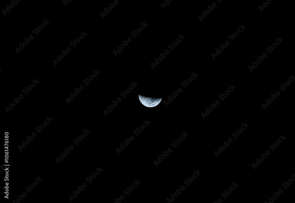 detailed blue crescent moon with black background detailed blue crescent moon with black background