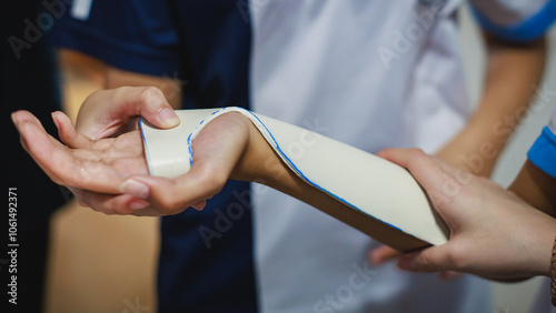 Medical Orthopedic Hand Splint for Wrist and Finger Stabilization. Fabrication Wrist Brace for Injury Recovery. Rehabilitation of Occupational Therapy for Arthritis Patient.