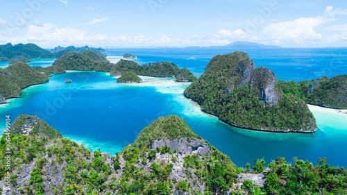 Aerial view of small natural islands in wayag bay, raja ampat, indonesia, southeast asia photo