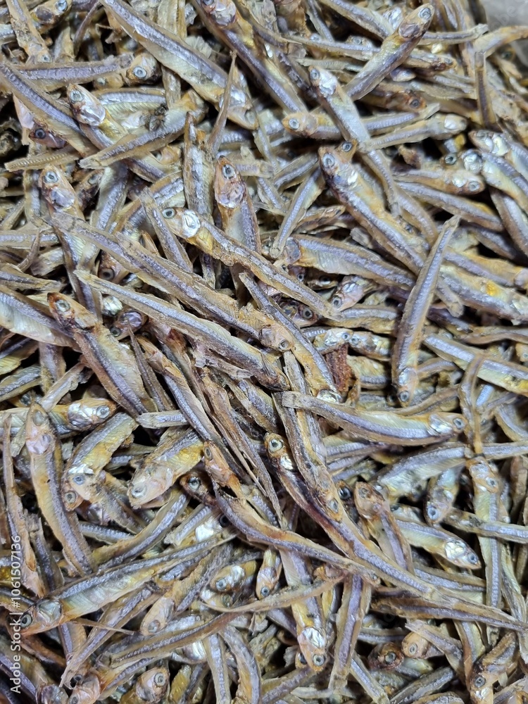 Dried anchovies are usually used as a complement or topping for savory foods.sh background Dried anchovies are usually used as a complement or topping for savory foods.sh background