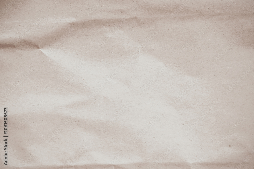 Naklejka premium Crumpled brown paper texture background for design with copy space for text or image.