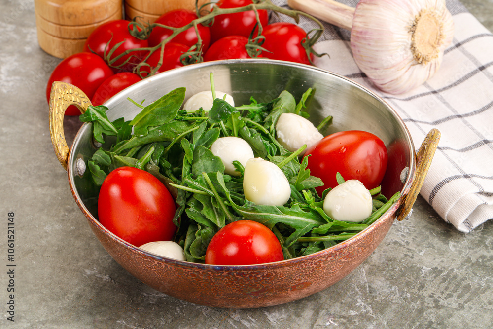 Salad with mozzarella and arugula Salad with mozzarella and arugula
