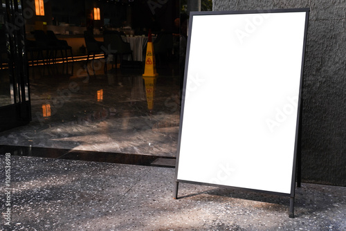 Signboard on the street. Angled empty menu board stand. Restaurant sidewalk white sign board. Freestanding A-frame advertising board near outdoor cafe.