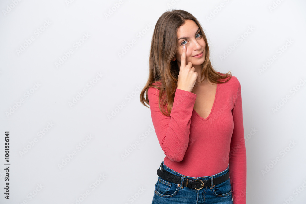 Young caucasian woman isolated on white background showing something Young caucasian woman isolated on white background showing something