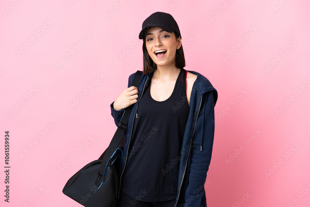 Young sport woman with sport bag isolated on pink background with surprise facial expression Young sport woman with sport bag isolated on pink background with surprise facial expression