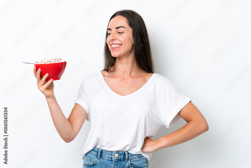 Young caucasian woman having breakfast milk isolated on white background with happy expression Young caucasian woman having breakfast milk isolated on white background with happy expression