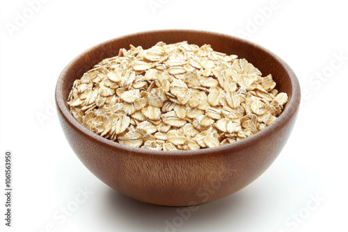 Oats in a wooden bowl, surrounded by fresh fruits and nuts, on a rustic table with a soft morning light filtering in.