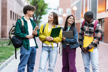 Group of university student friends together in the College campus. Diversity in global education 