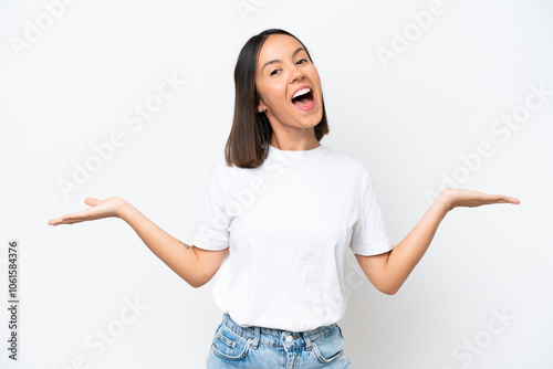 Young caucasian woman isolated on white background with shocked facial expression