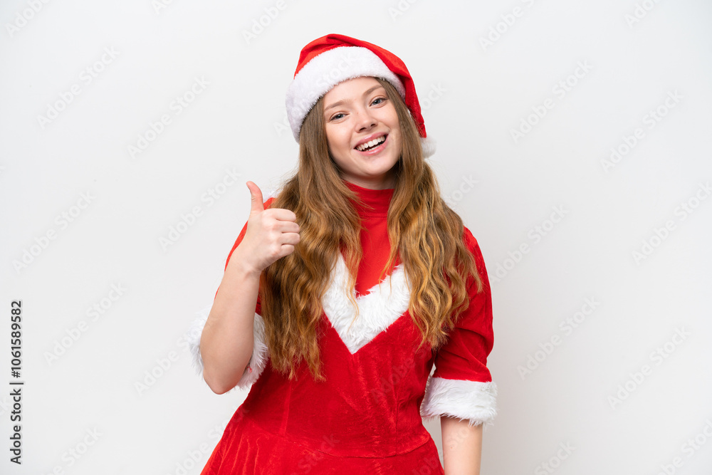 Young caucasian woman with Christmas dress isolated on white background with thumbs up because something good has happened Young caucasian woman with Christmas dress isolated on white background with thumbs up because something good has happened
