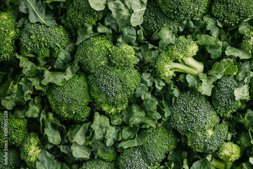 Cluster of fresh broccoli florets on a wooden chopping board, ready for cooking.