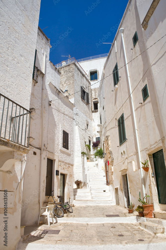 Vintage white street of downtown in Ostuni, Italy