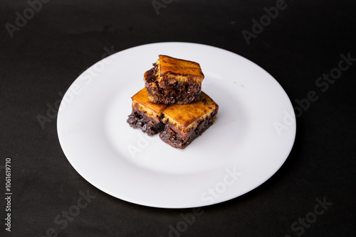 3 pieces of sweet martabak on a white plate, indonesian street food