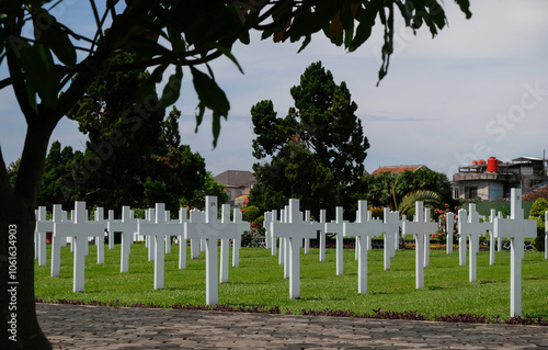 Bandung, Indonesia - January 8, 2023: Ereveld Pandu is one of 7 Netherlands war cemeteries in Indonesia where around 4000 war victims are buried. photo